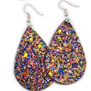 Glitter sparkles on vegan leather. Feather light!